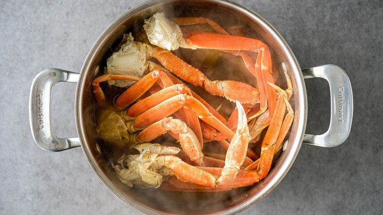 crab legs in pot