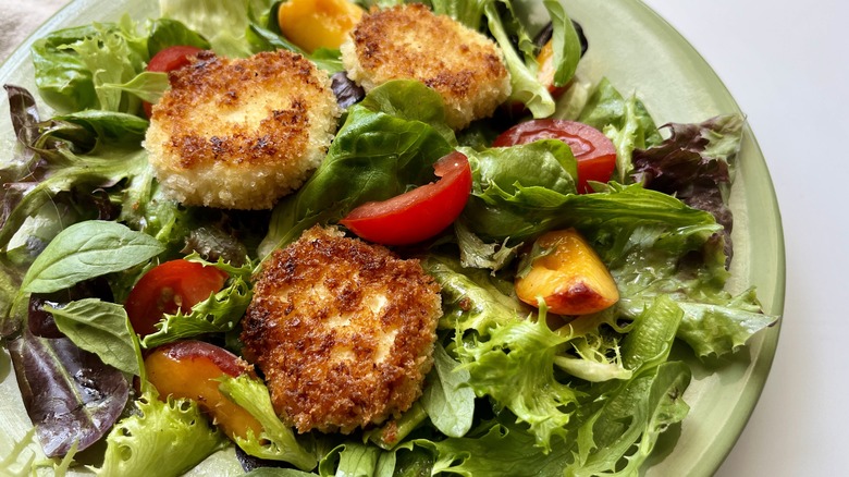 salad with fried cheese medallions