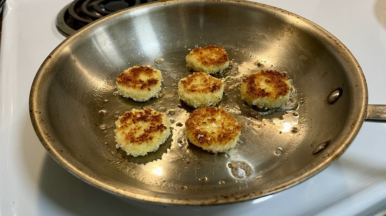 cheese coins in frying pan