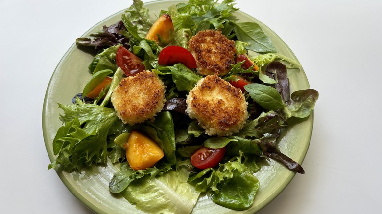 salad with fried cheese medallions