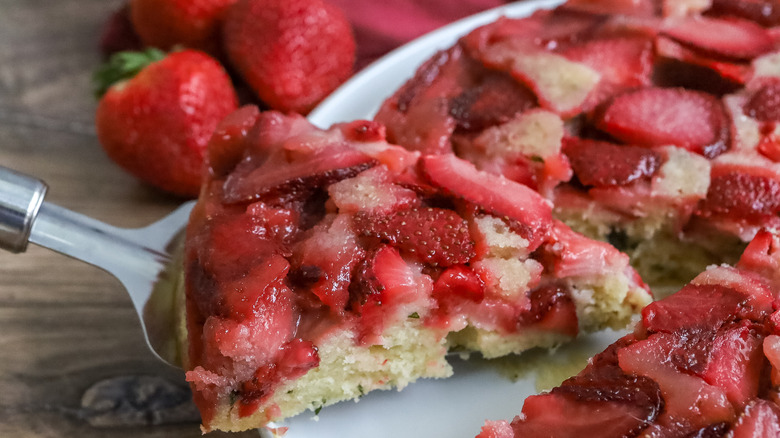 strawberry basil upside down cake being sliced