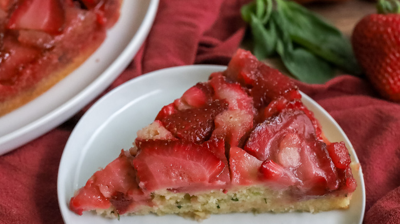 a slice of summery strawberry basil upside down cake