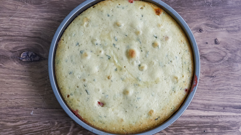 baked strawberry basil upside down cake in a pan