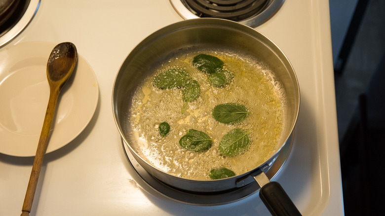 sage leaves cooking in butter