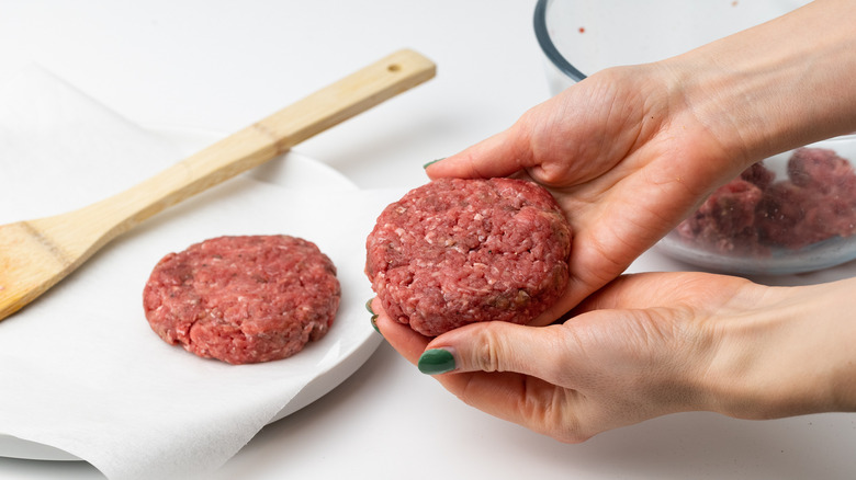 hamburger steaks being shaped