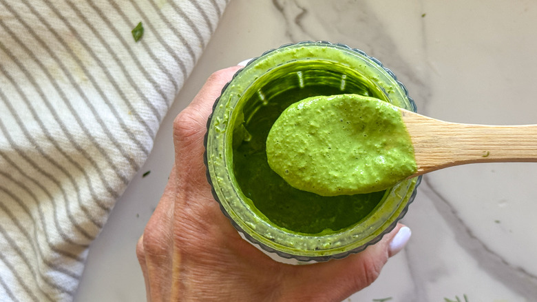 spoon of green dressing