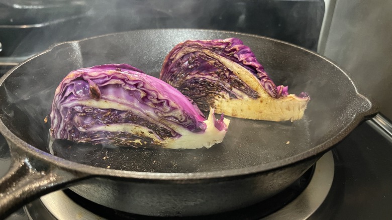 cabbage quarters searing in skillet