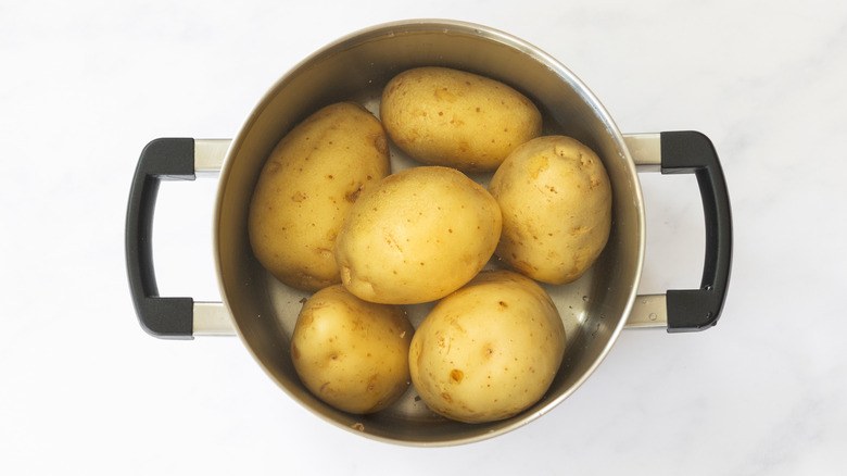 potatoes boiling in pot