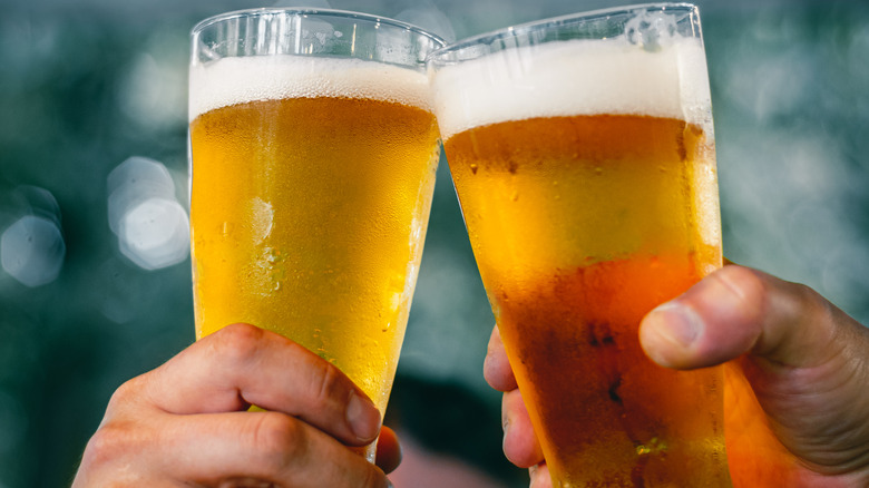 People toasting with beer