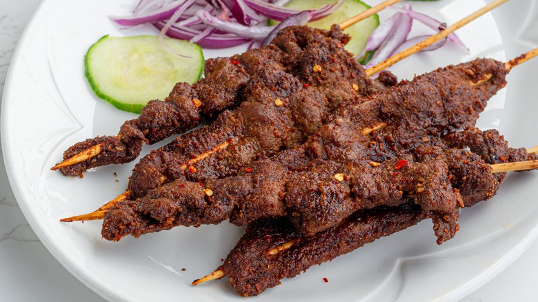 Suya prepared on a plate