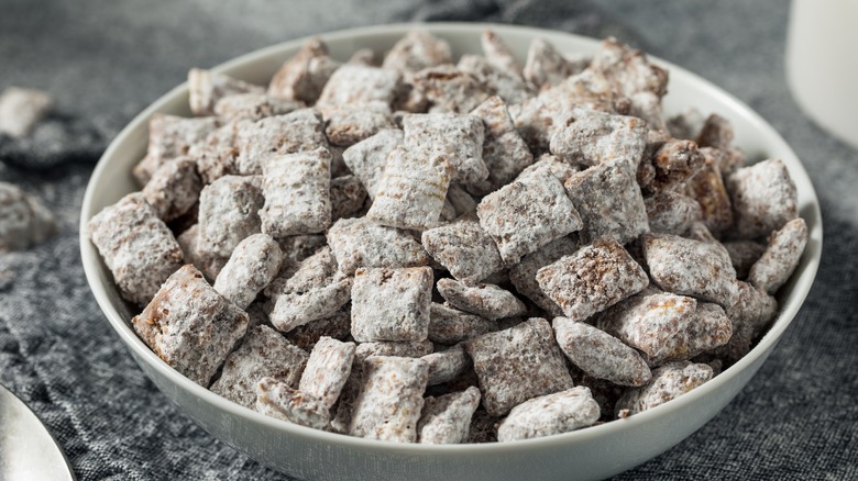 Puppy chow in gray bowl