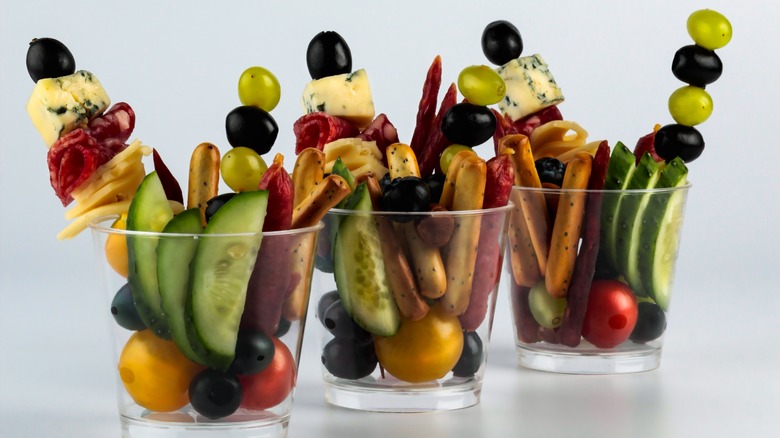 table of displayed charcuterie cups