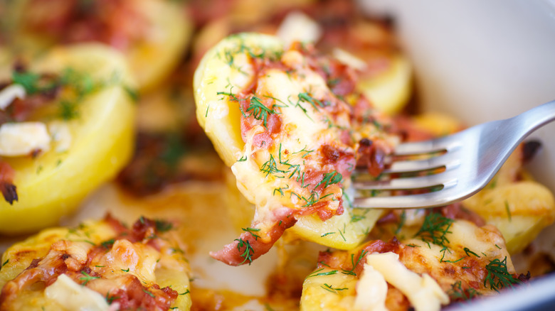 Potatoes with bacon, cheese, and dill