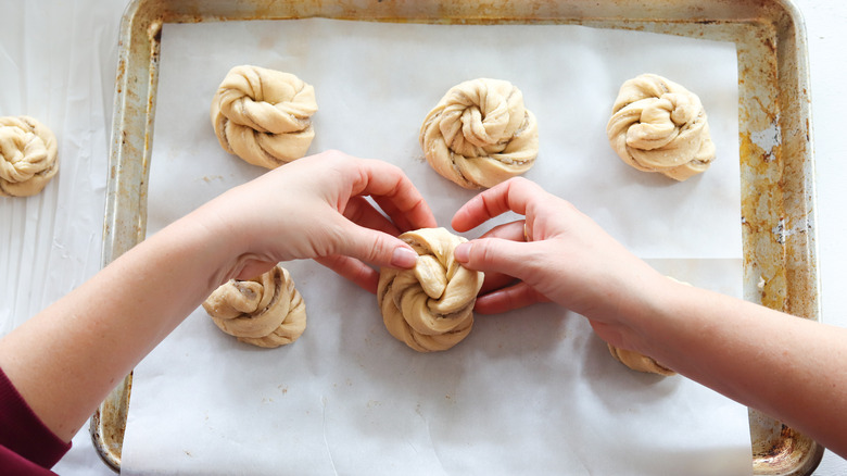 dough coils on a baking sheet