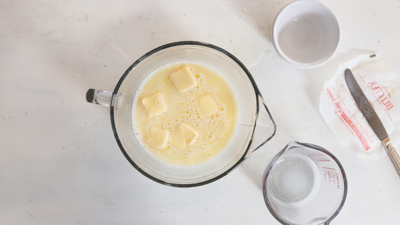 warm milk with butter in a bowl