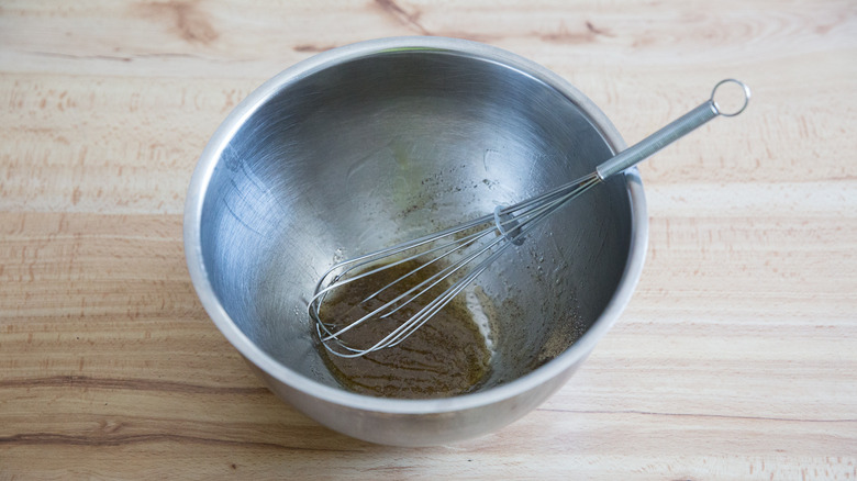 whisked marinade in metal bowl