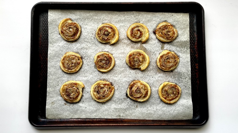 Monte Cristo Pinwheels baked on a baking sheet