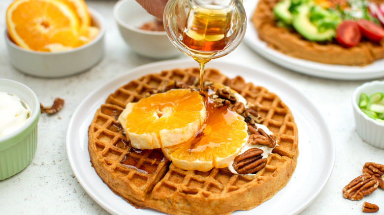 Sweet potato waffle with orange and syrup