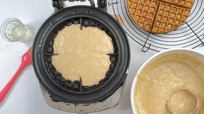 waffle batter in waffle iron