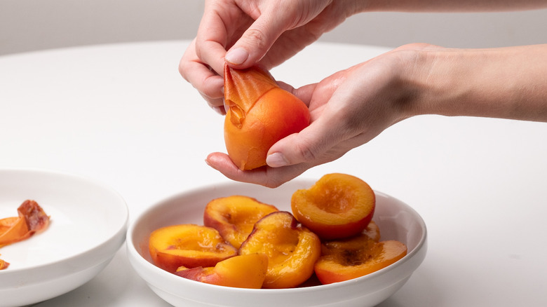 peeling poached peaches