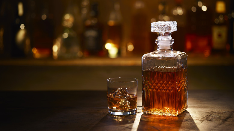 Bourbon in glass and decanter