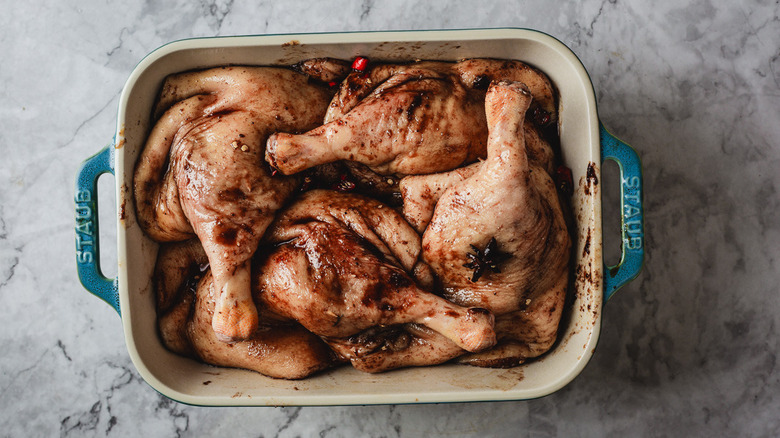 Duck legs in baking dish