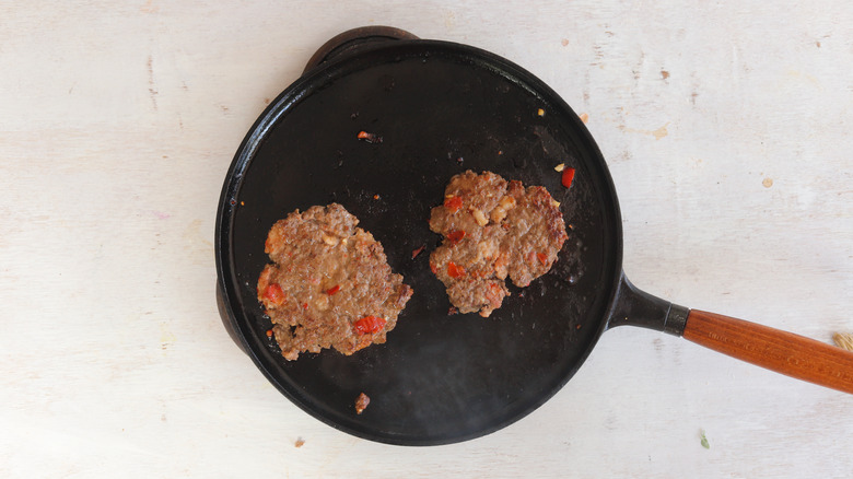 burger patties on griddle