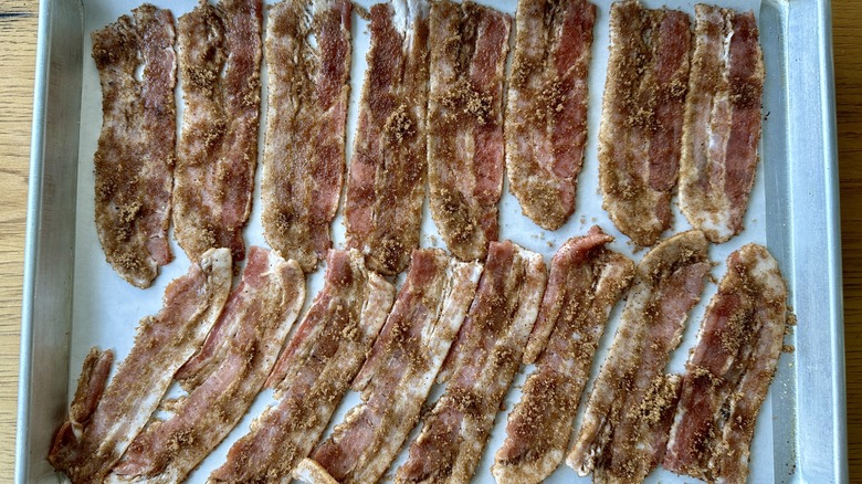 Sugar coated bacon on baking sheet