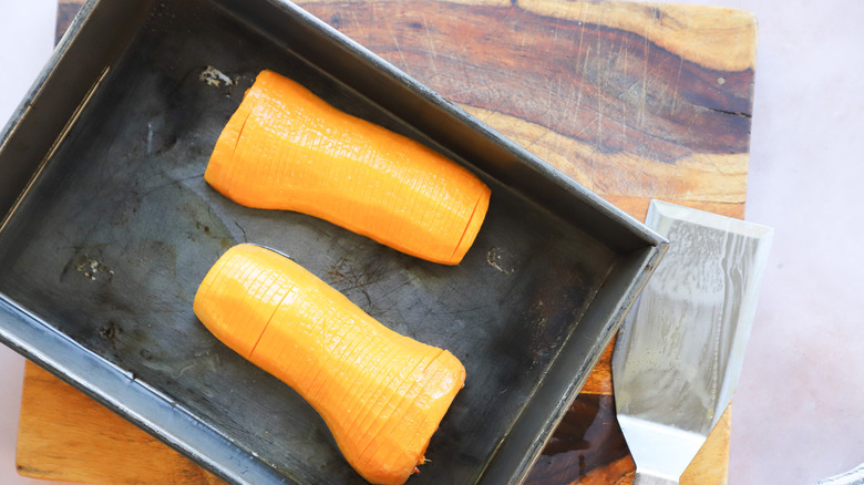 Sliced squash in roasting pan