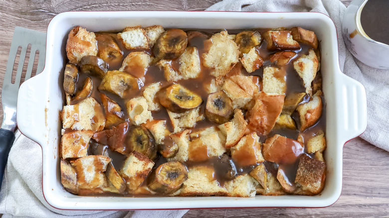 caramel poured over finished bread pudding