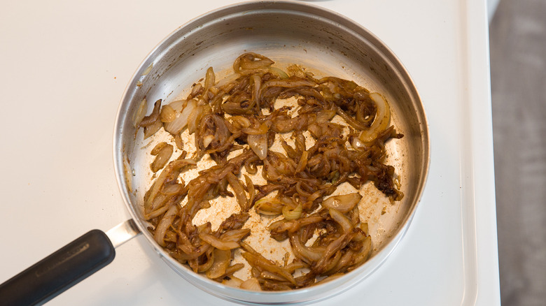 browned caramelized onions in pan 