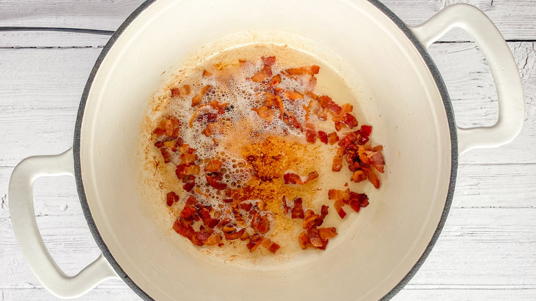 pan of oil frying bacon