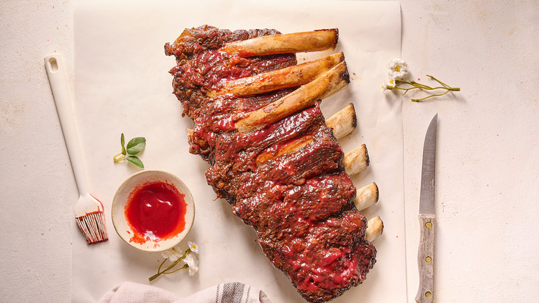 ribs with barbecue sauce on table