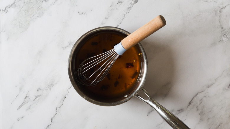 Glaze with whisk in saucepan