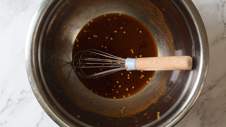 Sweet tea marinade with whisk in bowl