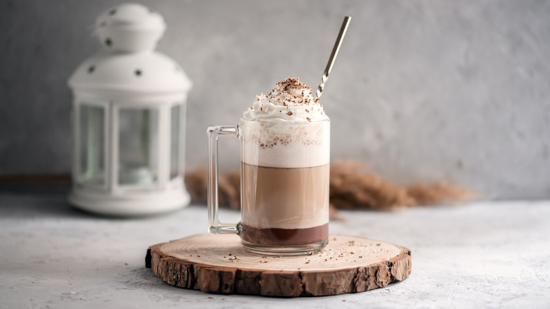 Hot chocolate with whipped cream and chocolate shavings