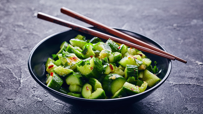 smashed cucumber salad with chopsticks