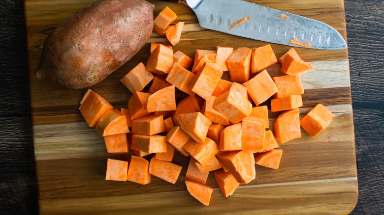 chopped sweet potato on cutting board