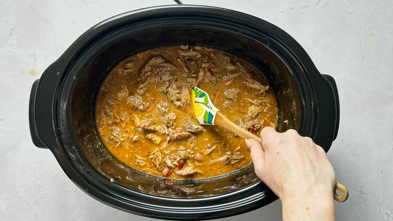 stirring masa into chili