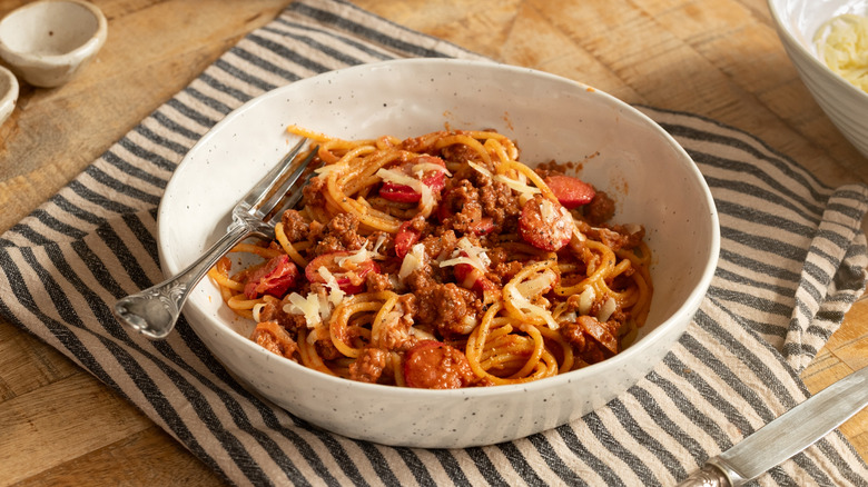 Filipino spaghetti in bowl with fork