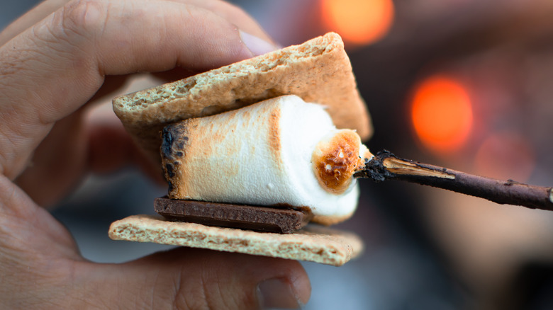 building s'more with roasted marshmallow