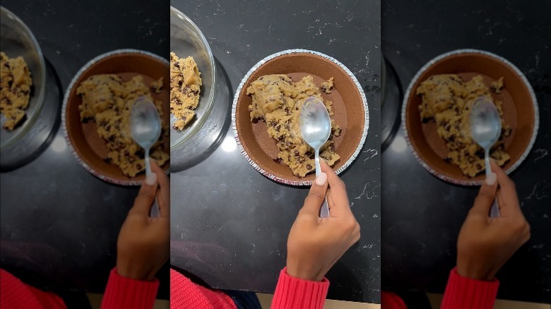 filling pie crust with cookie dough