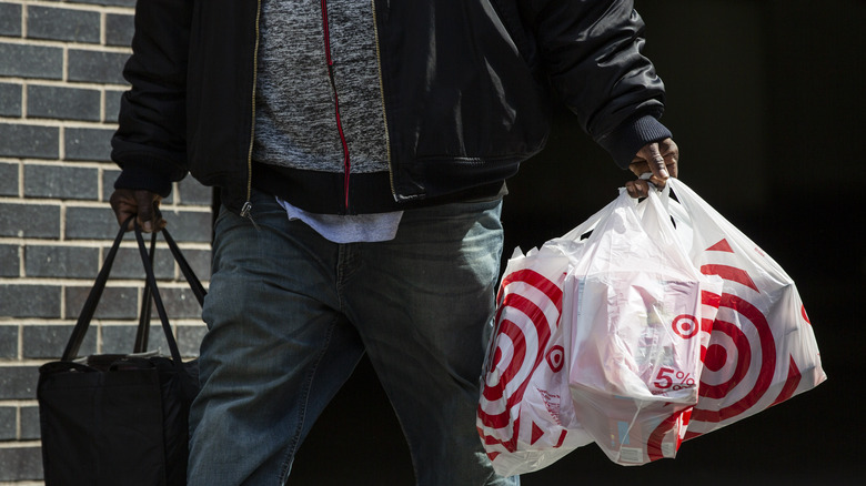 Person carrying target shopping bags