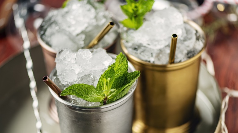 Three Mint Juleps on a tray