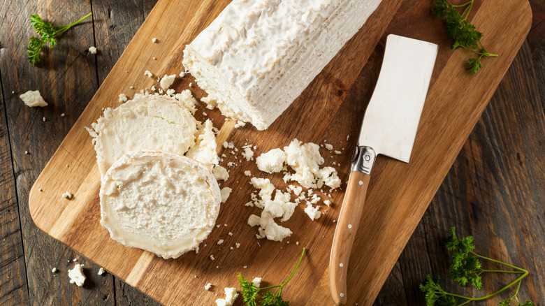 goat cheese on cutting board