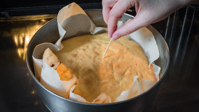 Checking cake for doneness