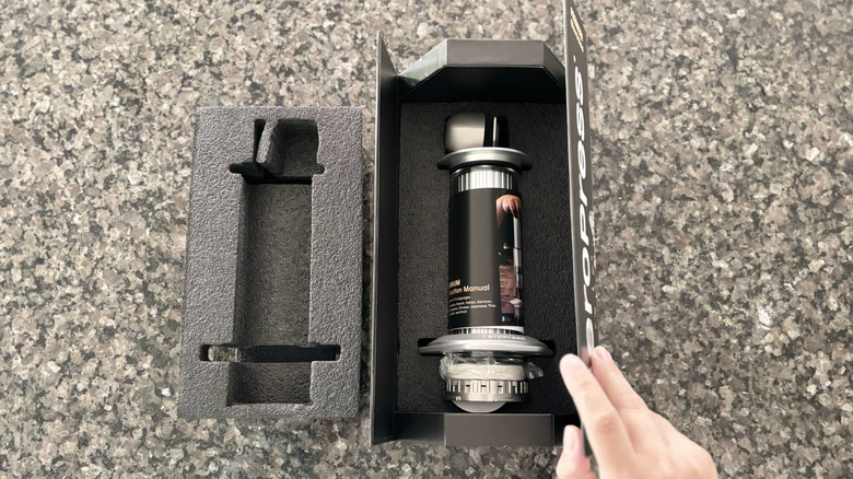 An open box shows how the AeroPress Premium is packaged.