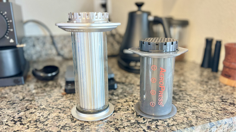 The AeroPress Premium and AeroPress Original are placed side by side for comparison.