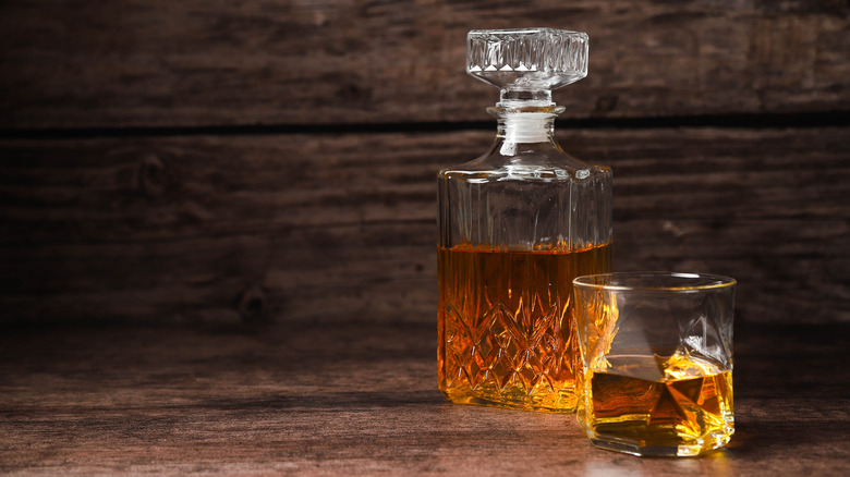 bourbon in glass and decanter