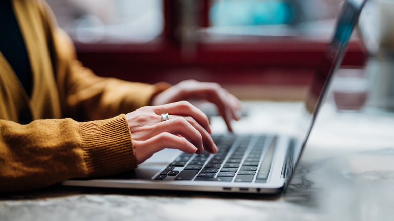 person using laptop